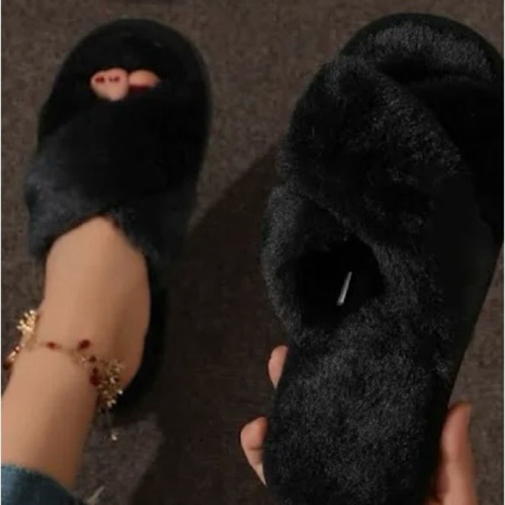 Black fuzzy slippers